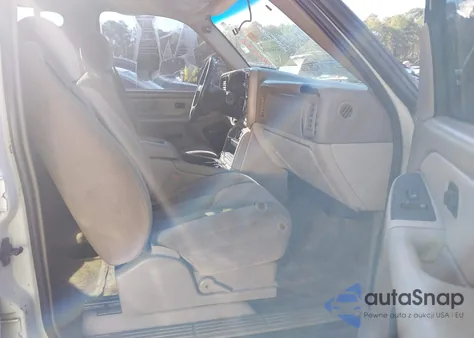 2003 GMC Yukon Sle z USA, uszkodzony, nr VIN 1GKEC13V73J120942